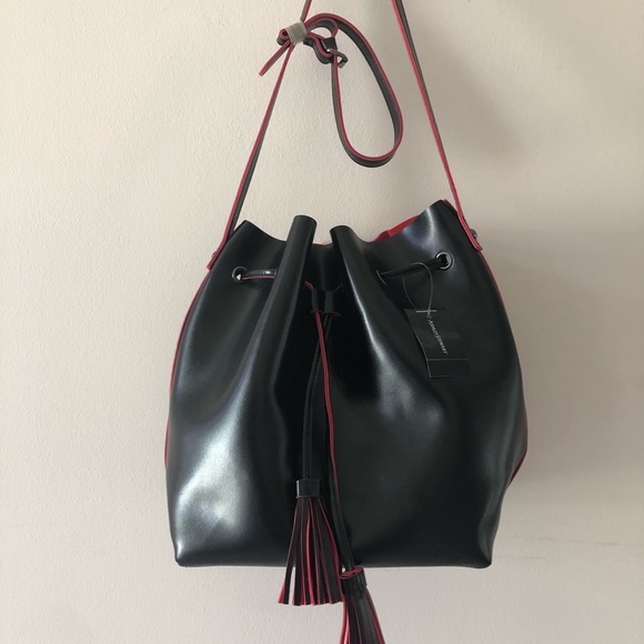 Ashley Stewart Handbags - Ashley Stewart Black/ Red Purse W/ Tassels